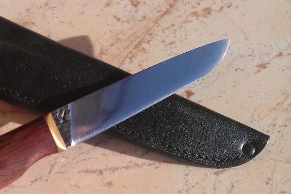Нож с выпуклым чечевицеобразным спуском